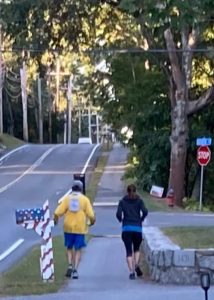 Mark Sheeran and Meg Jacobs running at mile 20